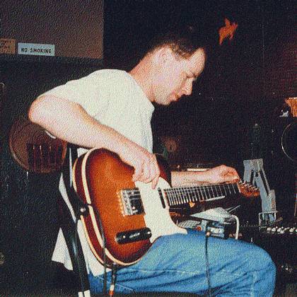 Mark tuning Fender Telecaster belonging to Gary Verberne, Lab Studios '96, includes flying pig.